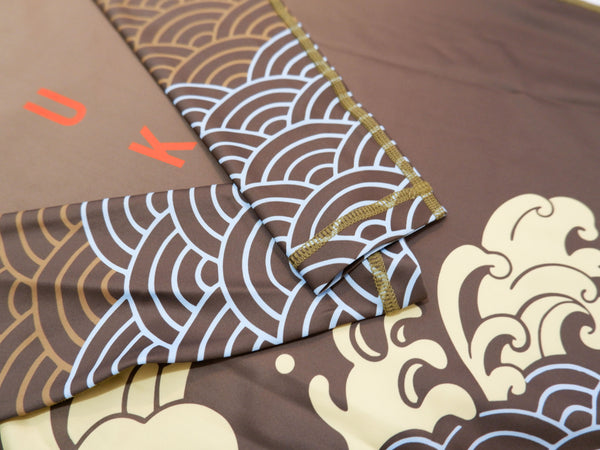 A detailed shot of the Asian aesthetic design on the BJJ rashguard.