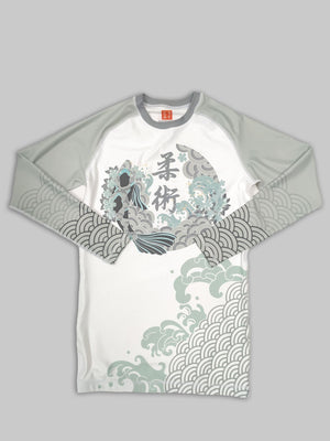 A cool bjj rash guard that features Asian aesthetic graphics. The white jiu jitsu rash guard has gray sleeves and gray graphic elements and a Koi design in the center. This is a rash guard for both men's and women's bjj.